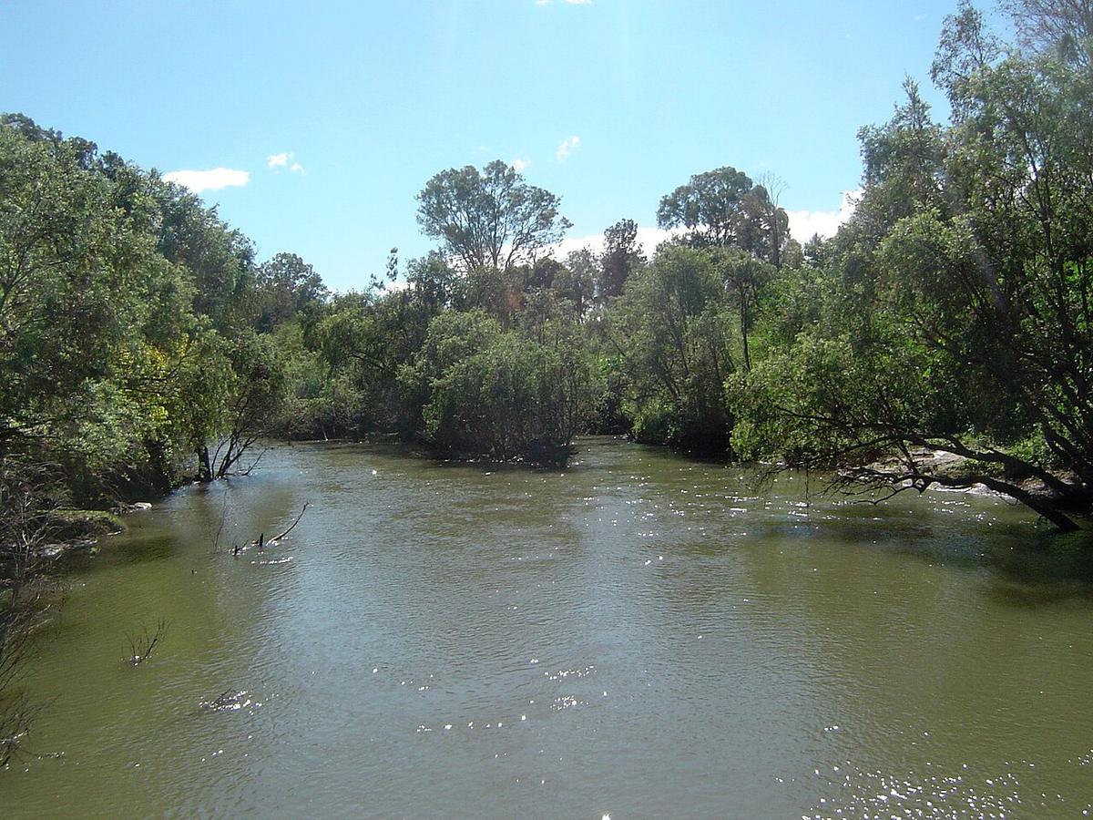The Logan River looking downstream from the old bridge at Jimboomba Lions Park, south-east Queensland
